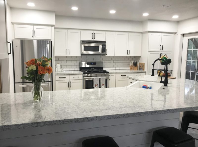 Kitchen Remodeling by refacing the cabinet with white shakers